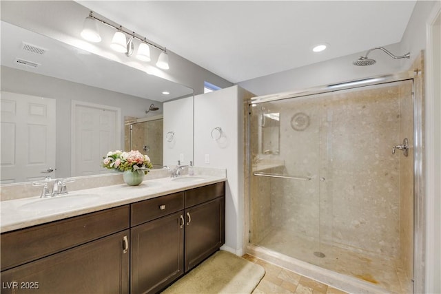 bathroom featuring vanity and walk in shower