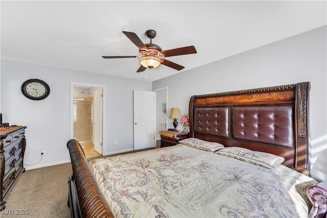 bedroom featuring ceiling fan, connected bathroom, and light colored carpet