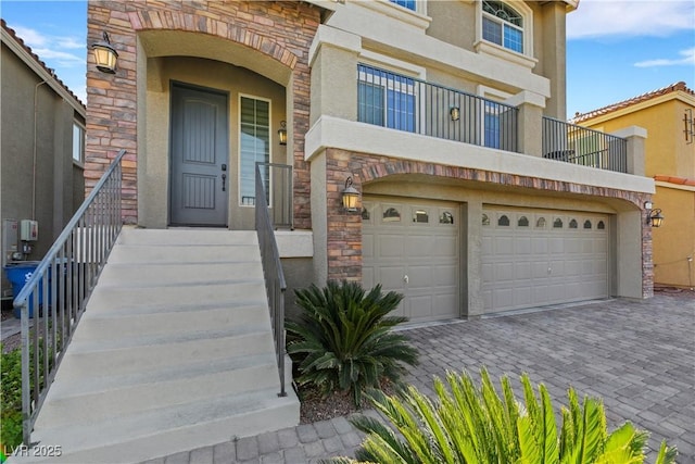 view of front of property with a garage