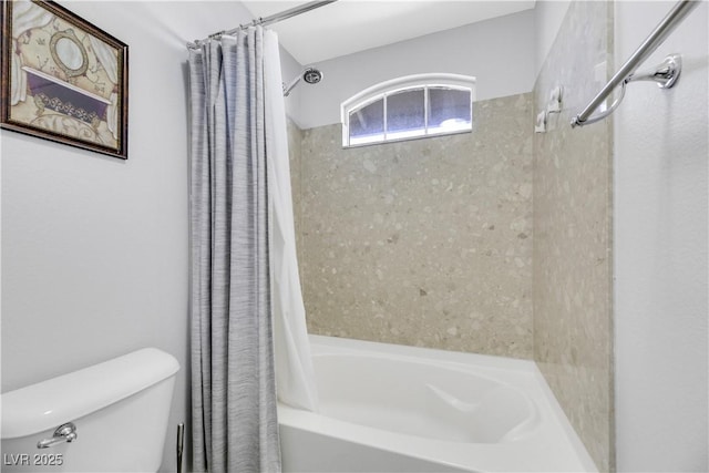 bathroom featuring toilet and shower / bathtub combination with curtain