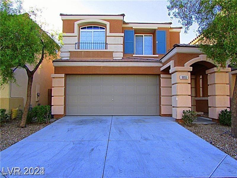 view of front of property featuring a garage