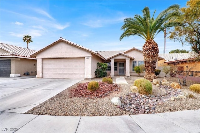 view of front of property with a garage