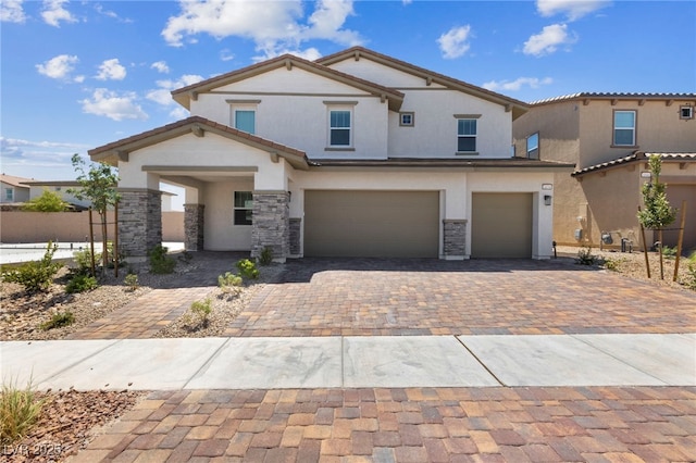 view of front of property with a garage