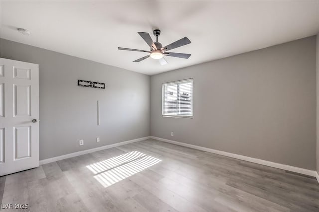 unfurnished room featuring ceiling fan and light hardwood / wood-style floors