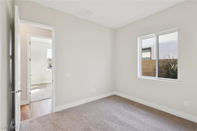 view of carpeted spare room