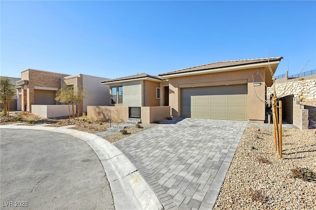 view of front of property featuring a garage