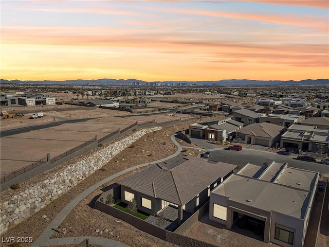 aerial view at dusk with a mountain view