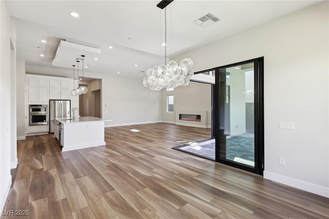 interior space with hardwood / wood-style flooring