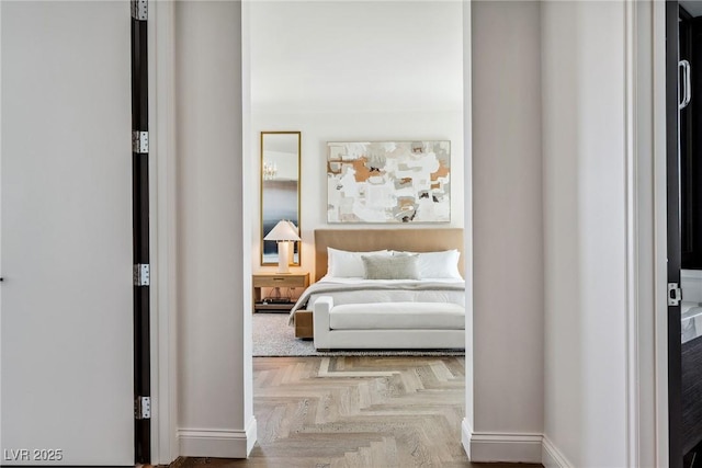 bedroom with parquet flooring