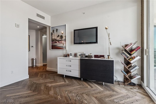 bar featuring white cabinets and dark parquet floors