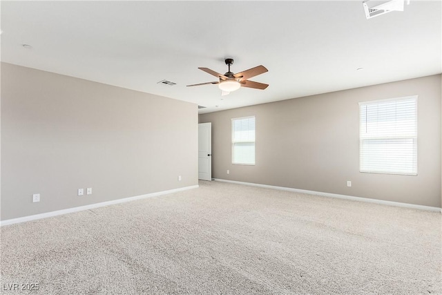 carpeted empty room with ceiling fan