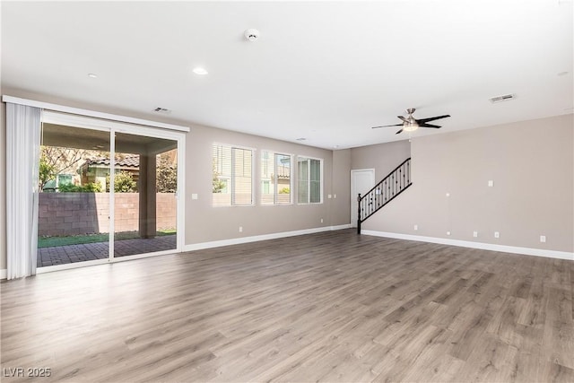 interior space featuring ceiling fan and light hardwood / wood-style floors