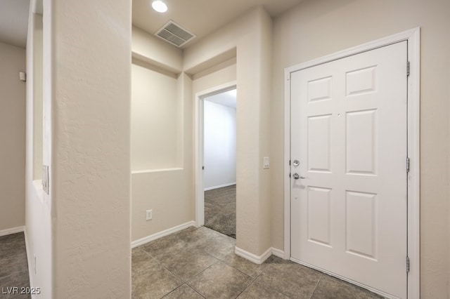 corridor with carpet flooring