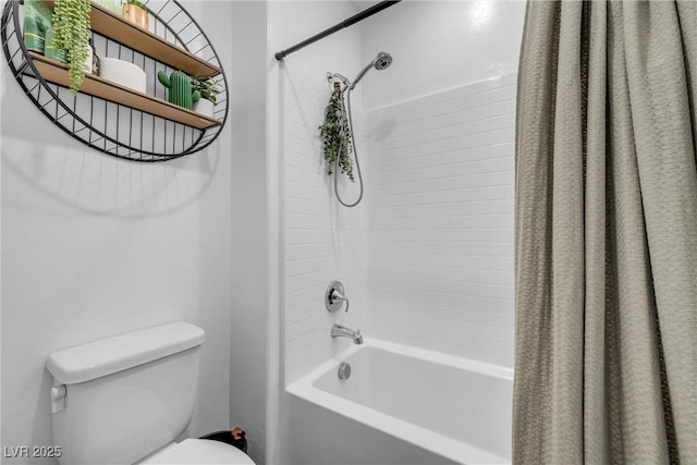 bathroom with shower / bathtub combination with curtain and toilet