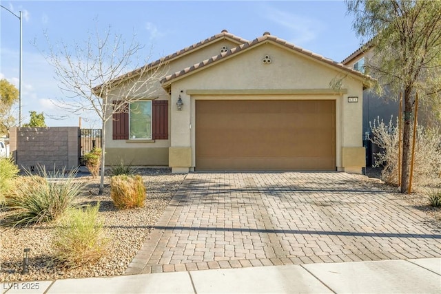 view of front of property with a garage