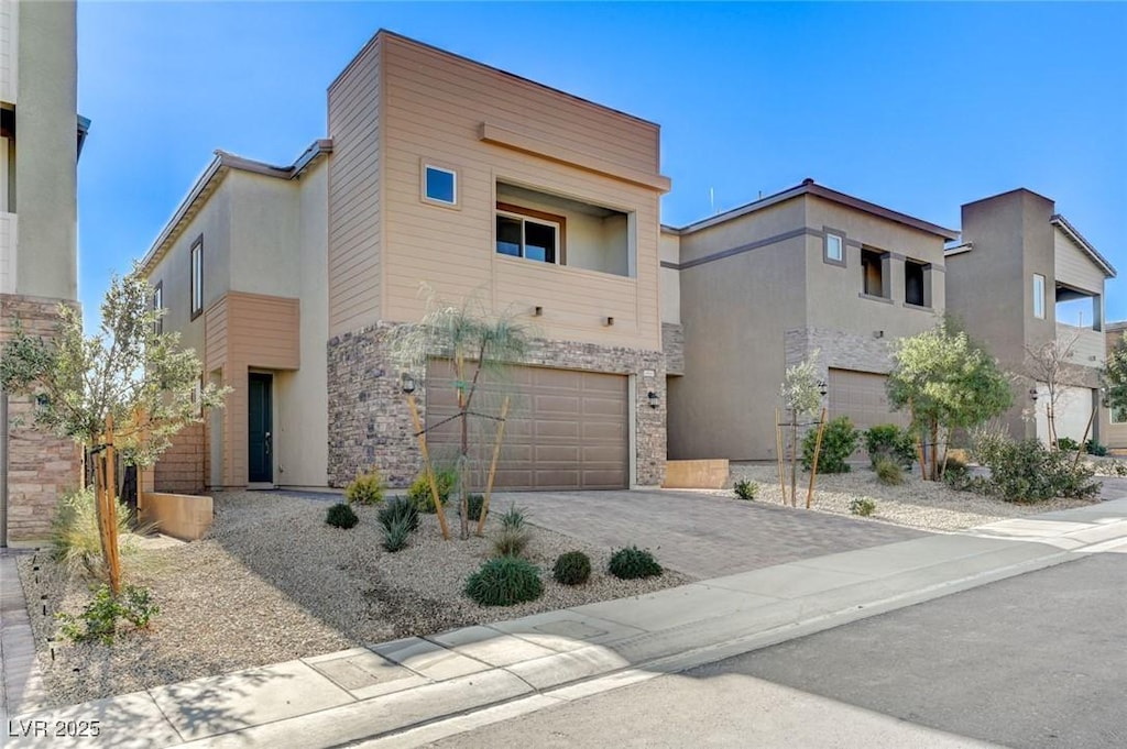 modern home featuring a garage