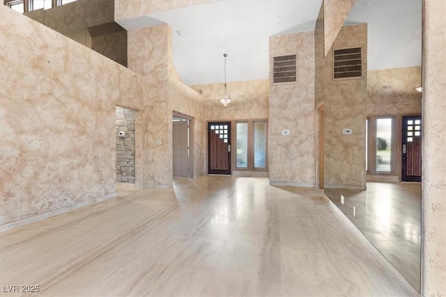 foyer with a high ceiling