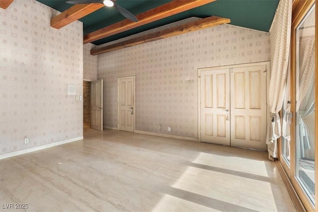 interior space featuring high vaulted ceiling, beamed ceiling, and ceiling fan