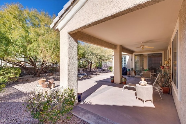 view of patio with ceiling fan