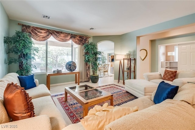 living room with tile patterned flooring