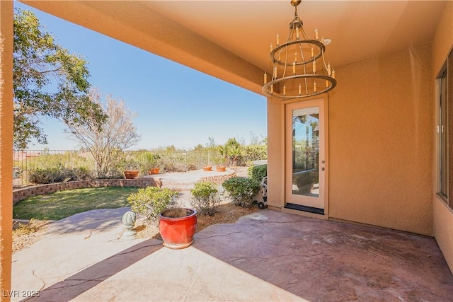 view of patio featuring fence