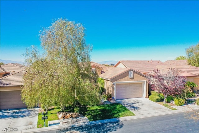 obstructed view of property featuring a garage