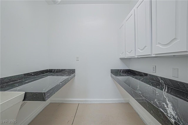 washroom featuring light tile patterned flooring