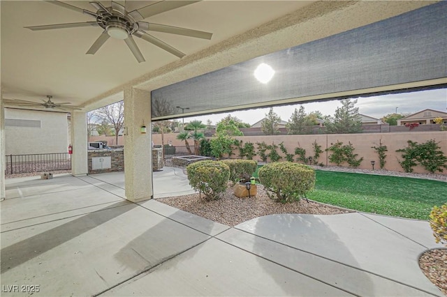 view of patio / terrace featuring area for grilling and ceiling fan