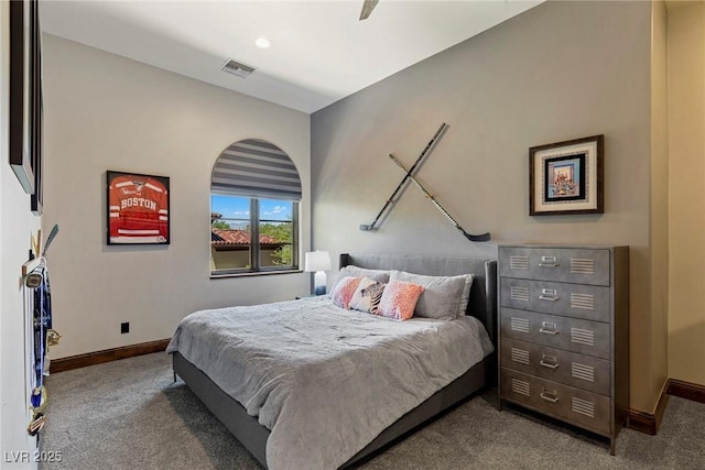 carpeted bedroom with ceiling fan