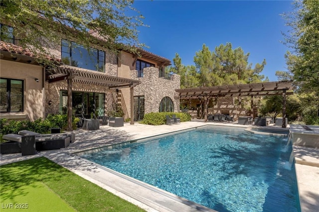 back of property featuring pool water feature, a pergola, and a patio