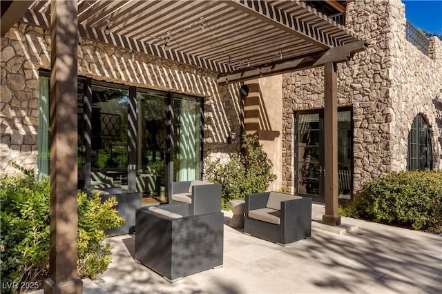 view of patio / terrace with outdoor lounge area and a pergola