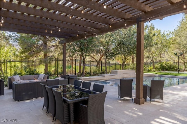 view of patio featuring a fenced in pool, a pergola, and an outdoor hangout area