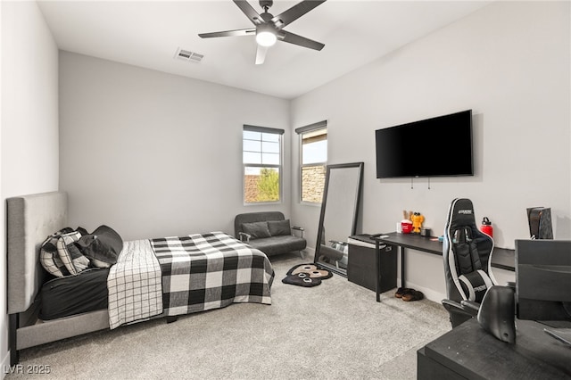 carpeted bedroom with ceiling fan