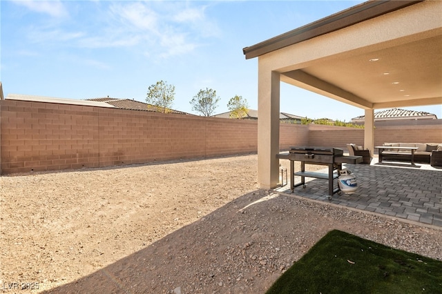 view of yard with an outdoor hangout area and a patio area