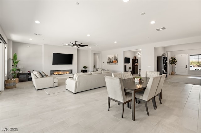 dining space with ceiling fan