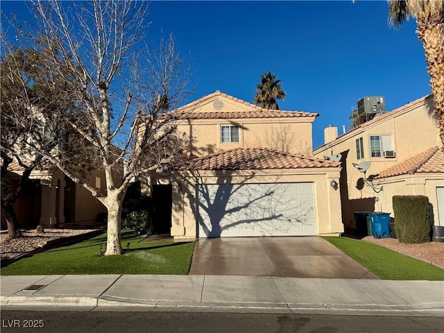 mediterranean / spanish-style house with a garage, central AC unit, and a front lawn