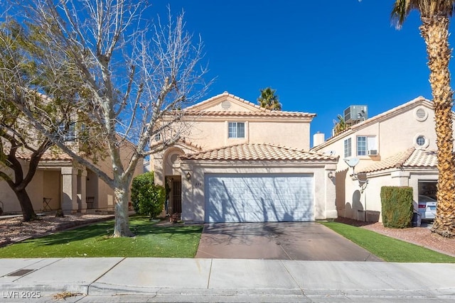 mediterranean / spanish home with central AC unit, a garage, a tiled roof, concrete driveway, and stucco siding