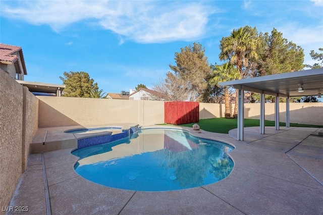 view of swimming pool with an in ground hot tub, a fenced backyard, a fenced in pool, and a patio