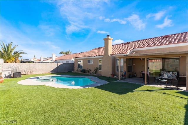 view of pool with central AC, a patio, and a lawn