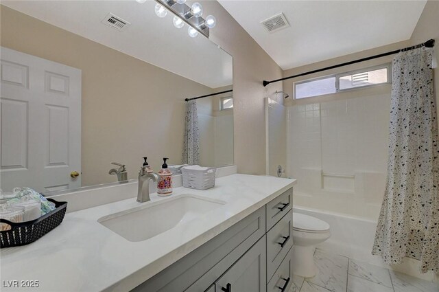 full bathroom with vanity, toilet, and shower / bath combo with shower curtain