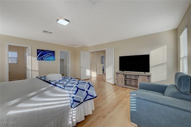 bedroom with light hardwood / wood-style flooring