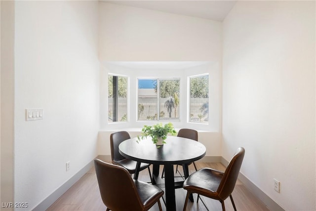 dining space featuring light hardwood / wood-style floors