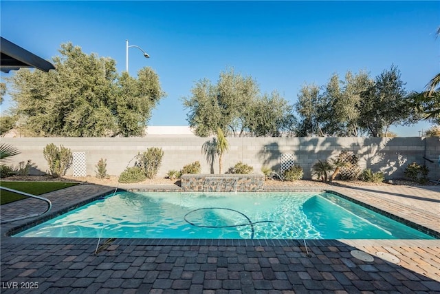 view of pool with pool water feature