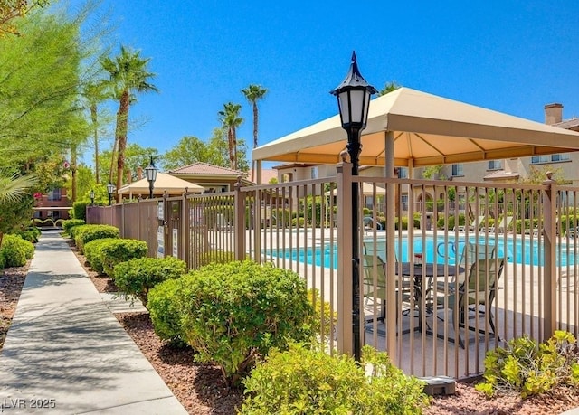 view of swimming pool with a gazebo