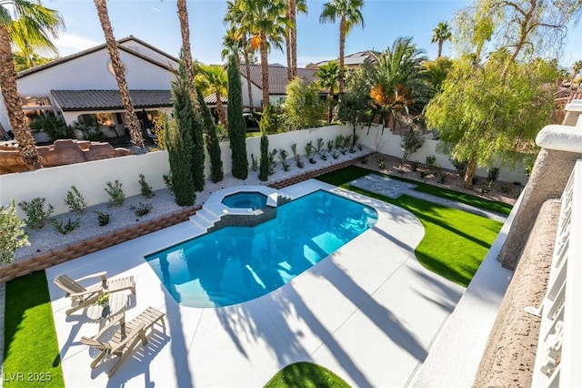 view of swimming pool featuring an in ground hot tub and a patio area