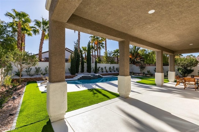 view of swimming pool with a patio area