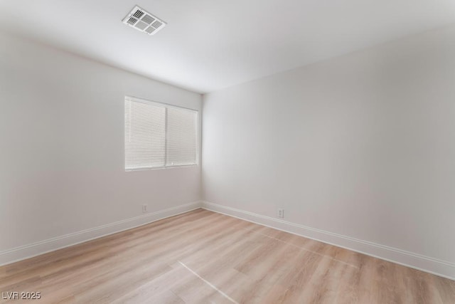 empty room featuring light hardwood / wood-style flooring