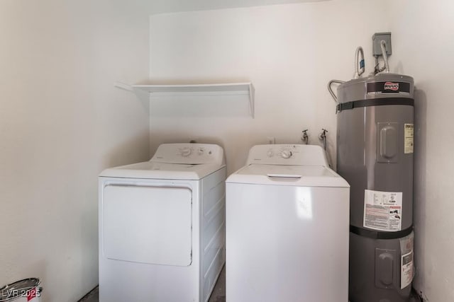 laundry area featuring washing machine and dryer and secured water heater