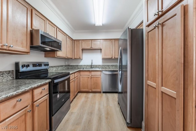 kitchen with sink, light hardwood / wood-style flooring, ornamental molding, stainless steel appliances, and light stone countertops