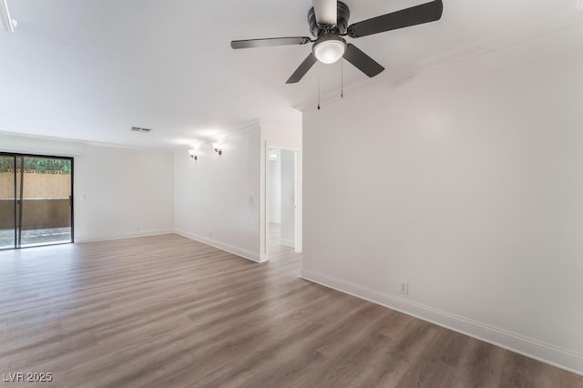 unfurnished room with ornamental molding, ceiling fan, and light hardwood / wood-style floors